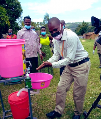 Coronavirus - Kenya: Hand-Washing Demonstration at Sirisia Market, Kenya