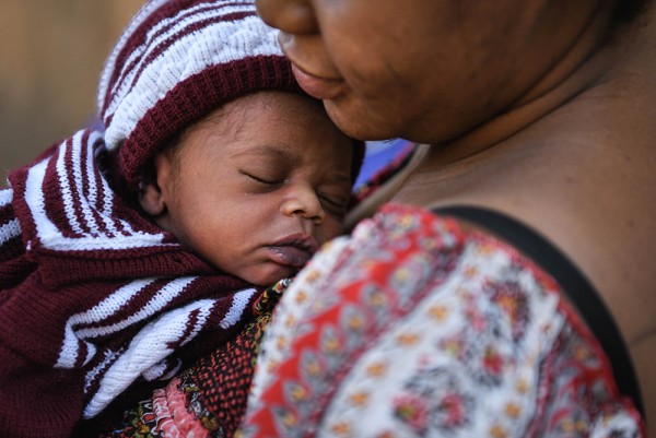 Special Delivery: Liberian Couple Turns Back from Dangerous Route to Europe. And Become Parents!